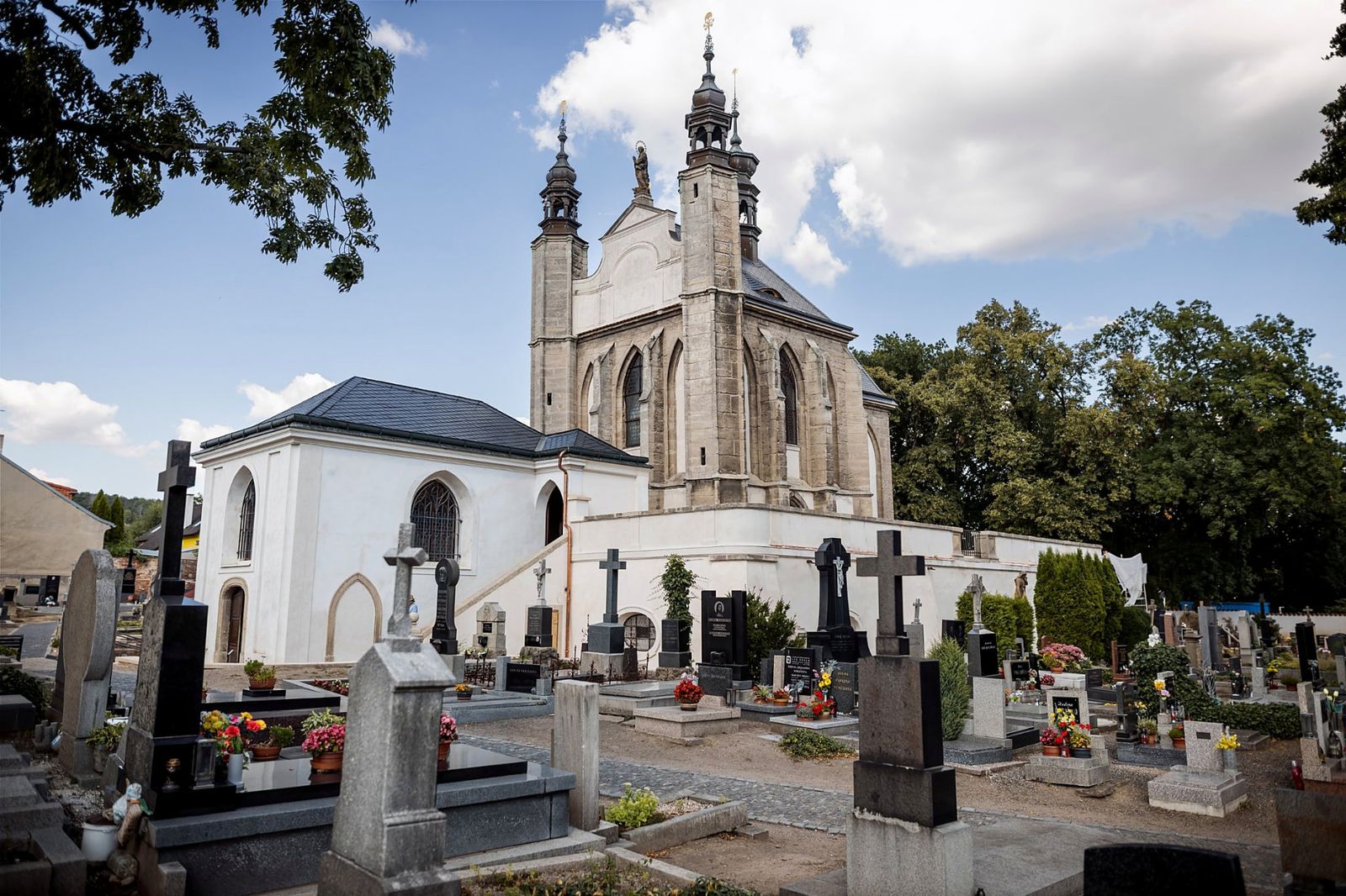 Exterior of the Sedlec Ossuary chapel surrounded by the cemetery in Kutná Hora
